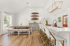 Dine in Hawaiian style with room for 12 between your dining table and island bar