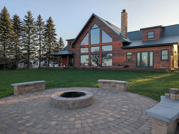 Large yard to hang out in on the lake side of the property.