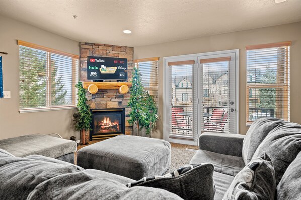 Soft recessed lighting adds a cozy ambiance, whether you're enjoying a quiet evening in or entertaining guests.