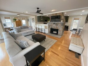 Spacious Living Room with Smart TV, work from home area, and a pull out sofa