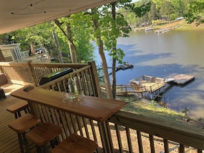 Upper deck and bar area overlooking lake