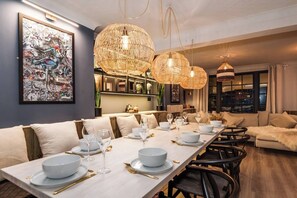 Huge dining table and comfortable seating - dines ten people.
