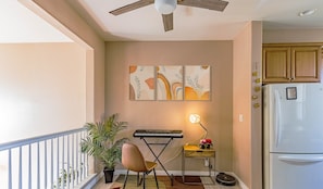 Discover a sunny, cozy nook w/ a keyboard you can play some musical tunes with