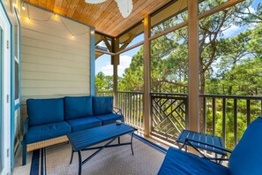 The screened in porch is the perfect spot for a morning coffee.  