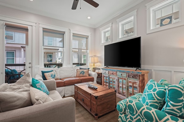 Living room with queen sofa bed and twin bed loveseat. Seating for 6.