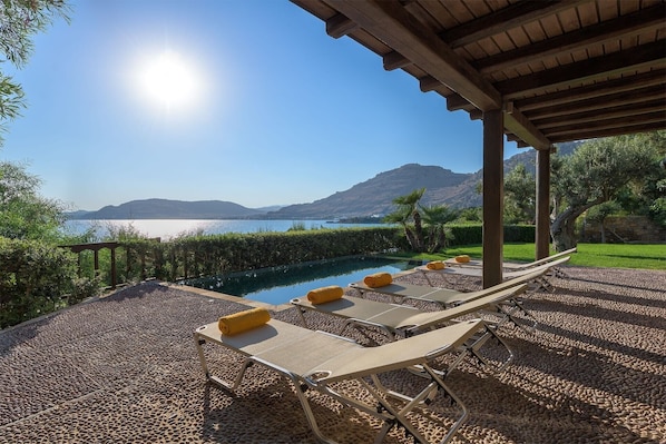 Lavish Rhodes Beachfront Villa | Villa Blue Bay | 6 Bedrooms | Ptivate Beach Access | Private Outdoor Heated infinity Pool | Spacious Furnished Terrace with Shaded Outdoor Dining Area | Private Garden, BBQ & Firepit | Prime Location | Pefki, Lindos