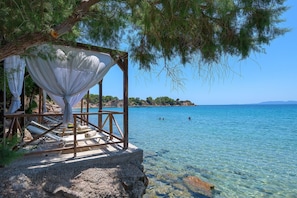 Lavish Rhodes Beachfront Villa | Villa Blue Bay | 6 Bedrooms | Ptivate Beach Access | Private Outdoor Heated infinity Pool | Spacious Furnished Terrace with Shaded Outdoor Dining Area | Private Garden, BBQ & Firepit | Prime Location | Pefki, Lindos