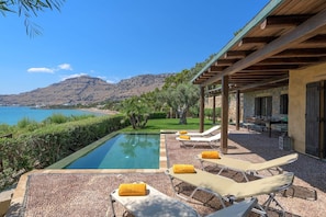 Lavish Rhodes Beachfront Villa | Villa Blue Bay | 6 Bedrooms | Ptivate Beach Access | Private Outdoor Heated infinity Pool | Spacious Furnished Terrace with Shaded Outdoor Dining Area | Private Garden, BBQ & Firepit | Prime Location | Pefki, Lindos