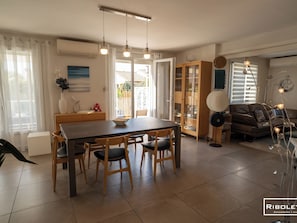 Air-conditioned living room with WiFi access to terrace