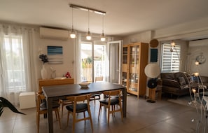 Air-conditioned living room with WiFi access to terrace