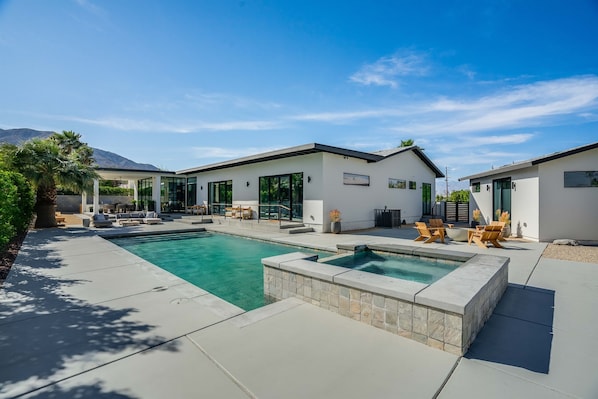 Relax, unwind, and recharge in the salt water pool and jacuzzi