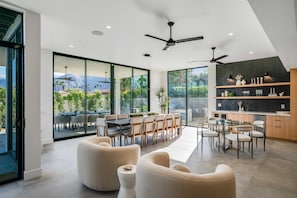 Dining room fitted custom 10ft x16ft sliders leading to outdoor dining
