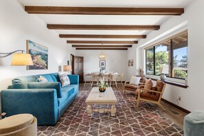 Living Room offers high beam ceilings!