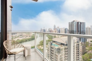 Balcony with city skyline views. (Carousel)