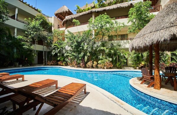 Community Pool with Terraces, Outdoor Dining Areas and Sun Loungers