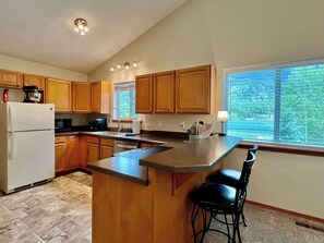Bright cheery kitchen with views of Lake Blaine