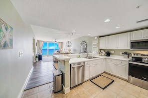The fully equipped kitchen features stainless-steel appliances and has everything you need to prepare meals for family & friends.