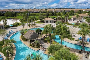 Lazy river, slide, pools, bar & restaurant, movie theatre, gym and much more at The Retreat Clubhouse! Free access for all guests! Just 2 miles across the community.