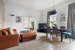Natural light floods the space through large windows.