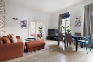 Natural light floods the space through large windows.