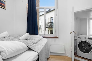 A peaceful space with soft bedding and a calming ambiance.