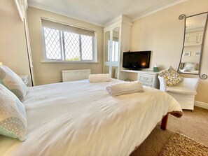 Double bed in bedroom of Heidaway Holiday Cottage, Padstow, North Cornwall