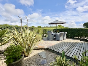 Decked rear patio area Wharf Cottage Holiday Cottage, Padstow, North Cornwall