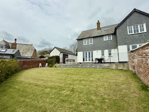 Rear lawned garden with Patio and seating at Trenaton, Holiday Home , Padstow Town, Cornwall