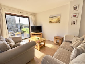 Tv and patio doors at Field View Holiday Cottage , Padstow North Cornwall