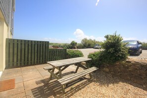 Patio garden area at Kegyn holiday home Harlyn Bay