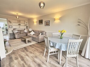Dining and living room areas of Curlews, 36 Egerton Road Holiday Cottage, Padstow, North Cornwall