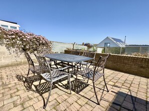 Patio to rear of Pendennis Holiday Cottage, Padstow, North Cornwall