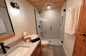 Lower Level Bathroom with walk-in shower and heated floor.