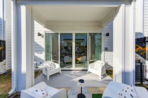 A patio area separated by glass sliding doors