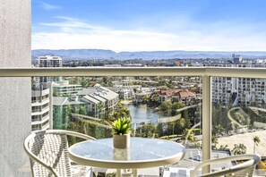Enjoy your morning coffee in this balcony overlooking the city and the river
