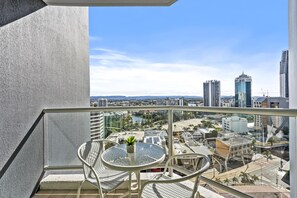 Enjoy your morning coffee in this balcony overlooking the city and the river