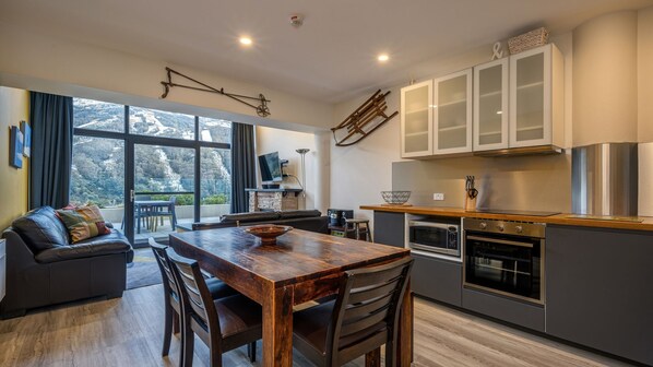 Kitchen, dining, living, terrace