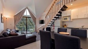 Living, balcony, dining