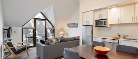 Living, dining, kitchen, balcony