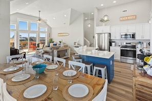 Eat together in the Dining Area or at the convenient Counter Bar.