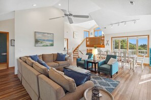 Gather in the open-concept Living Area on the top level to share stories of the day,