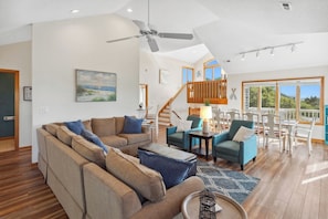 Gather in the open-concept Living Area on the top level to share stories of the day,