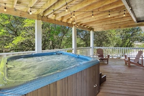 This dog-friendly home (2 dogs max) offers the perfect blend of comfort, convenience, and charm with a Private Pool, bubbly Hot Tub, and Screened-In Porch for cool evenings under the stars.