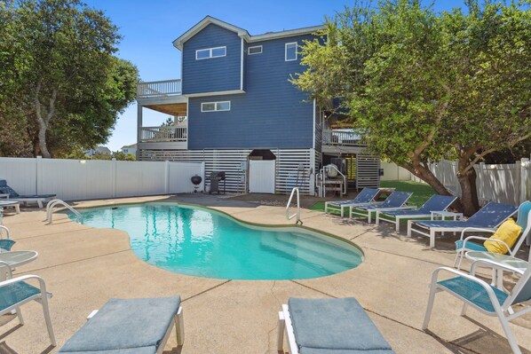 This dog-friendly home (2 dogs max) offers the perfect blend of comfort, convenience, and charm with a Private Pool, bubbly Hot Tub, and Screened-In Porch for cool evenings under the stars.