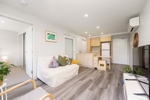 Relax in comfort with a cosy lounge area, perfect for movie nights or quiet afternoons.