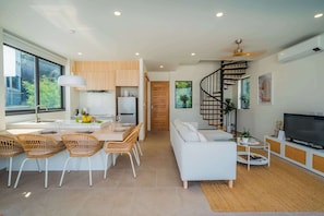 The villa features a fully equipped kitchen including induction stove, refrigerator, freezer, kitchenware, cooking equipment and a set of cookin essentials, such as salt, pepper, olive oil.