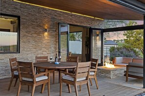 Outdoor dining by the firepit.
