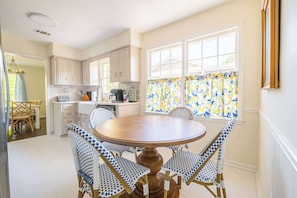 Start your day right in this bright and cheerful dining nook. Perfect for enjoying breakfast together or planning your next adventure.