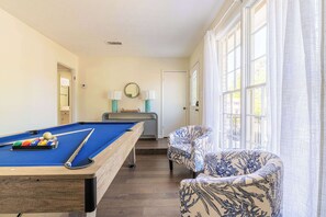 Game on! Enjoy friendly competition with a round of pool in this fun and inviting space. Perfect for entertaining and making memories.

