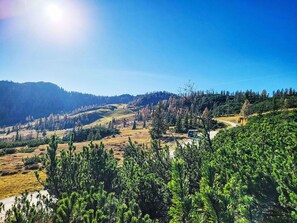 Sky, Blue, Mountainous Landforms, Green, Vegetation, Mountain, Natural Landscape, Hill, Wilderness, Highland